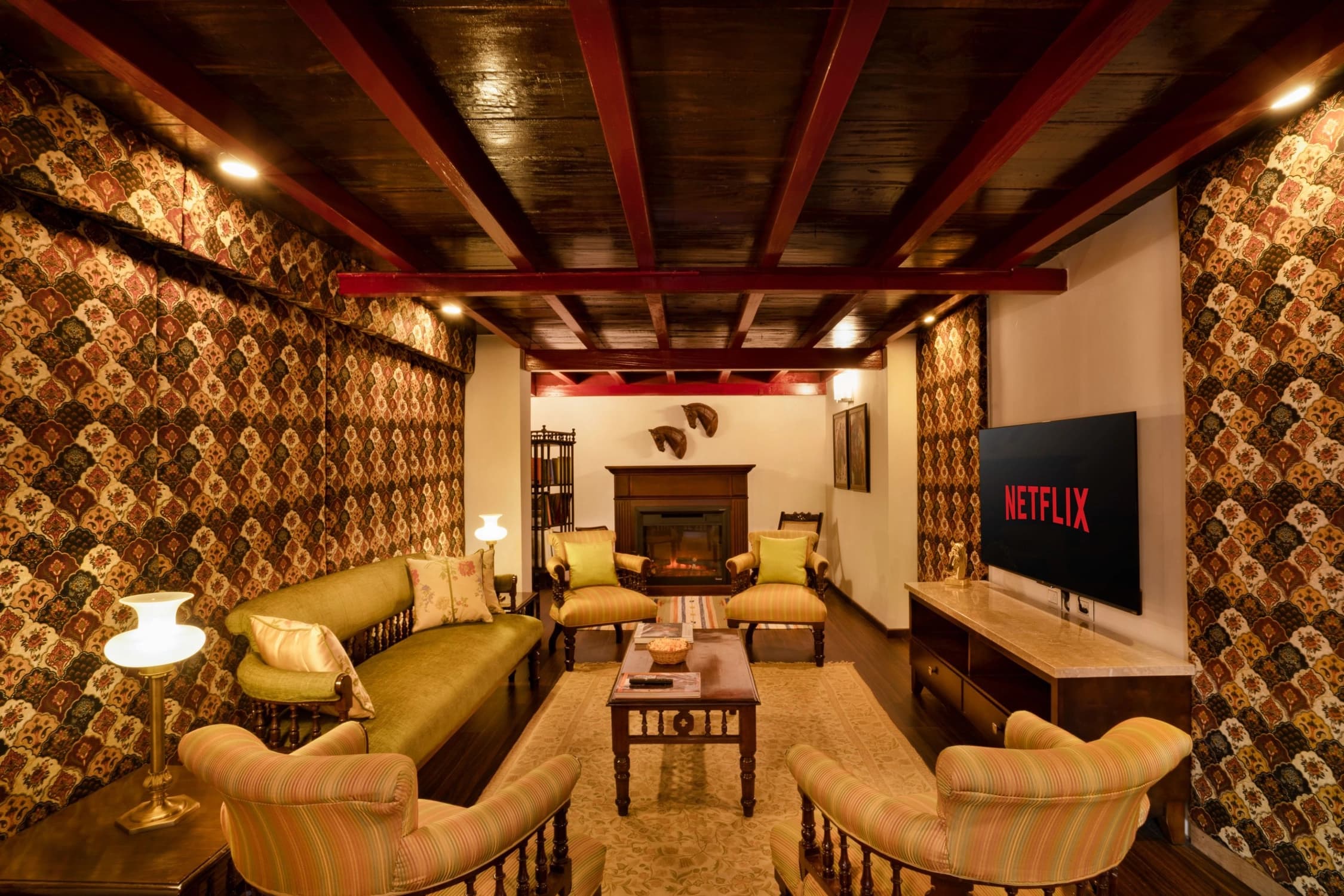 xl_23. Smart HDTV with comfy seating and an electric fireplace to keep you toasty. A bar counter and popcorn machine keep ideal company.